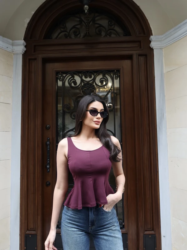 Chic and Comfortable Ribbed Peplum Blouse | Capzula Wholesale