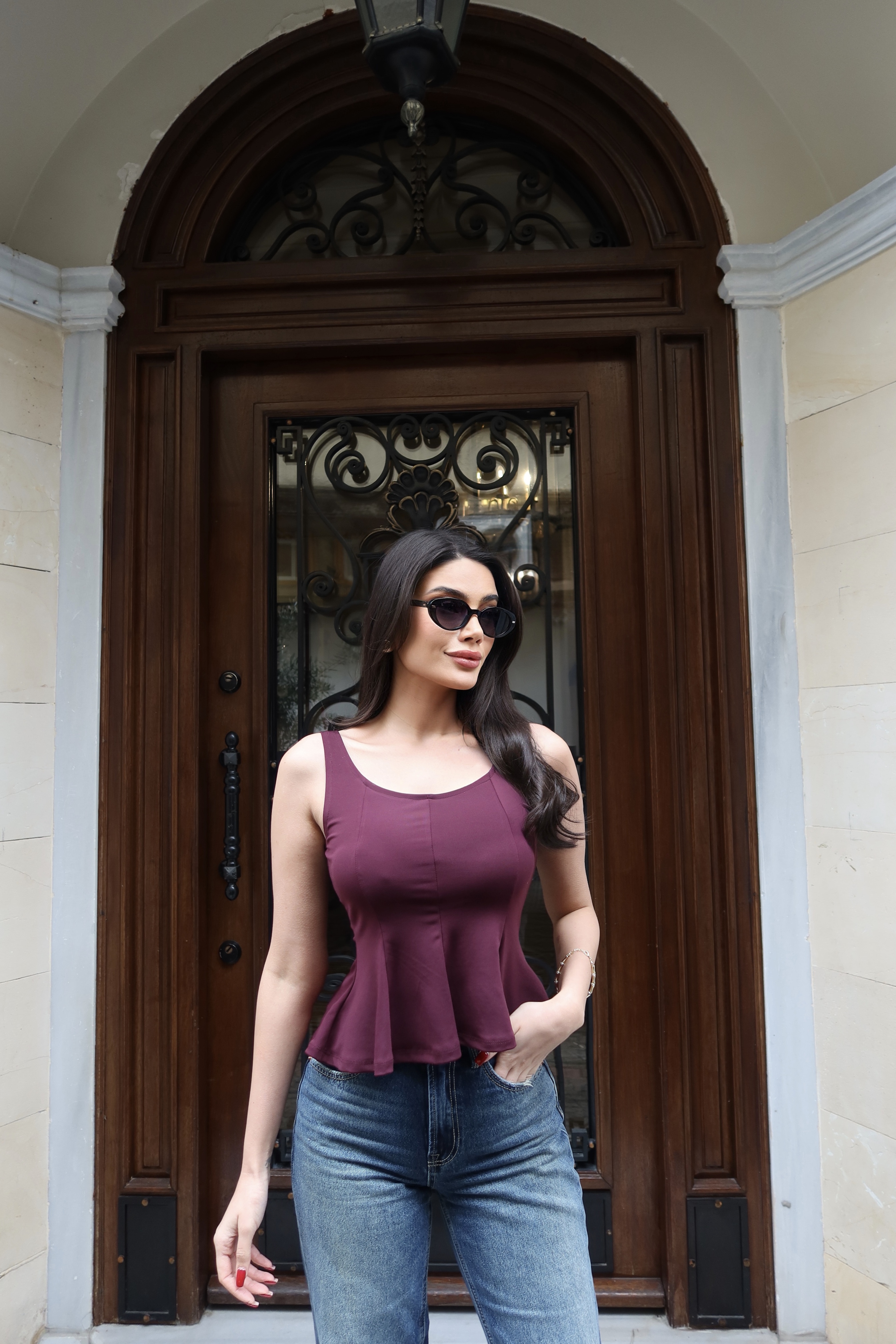 Chic and Comfortable Ribbed Peplum Blouse | Capzula Wholesale